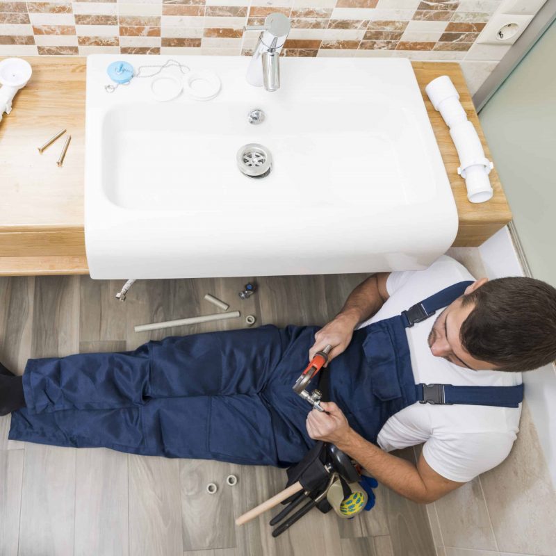 sanitary-technician-working-with-sink
